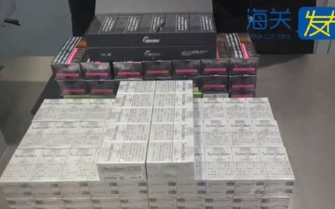 一名入境旅客行李箱发现异常，查获香烟10400支